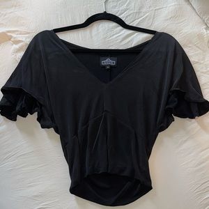 Black cropped top with capped sleeves. Size small